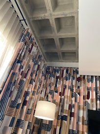 Open, concrete ceiling and huge windows!