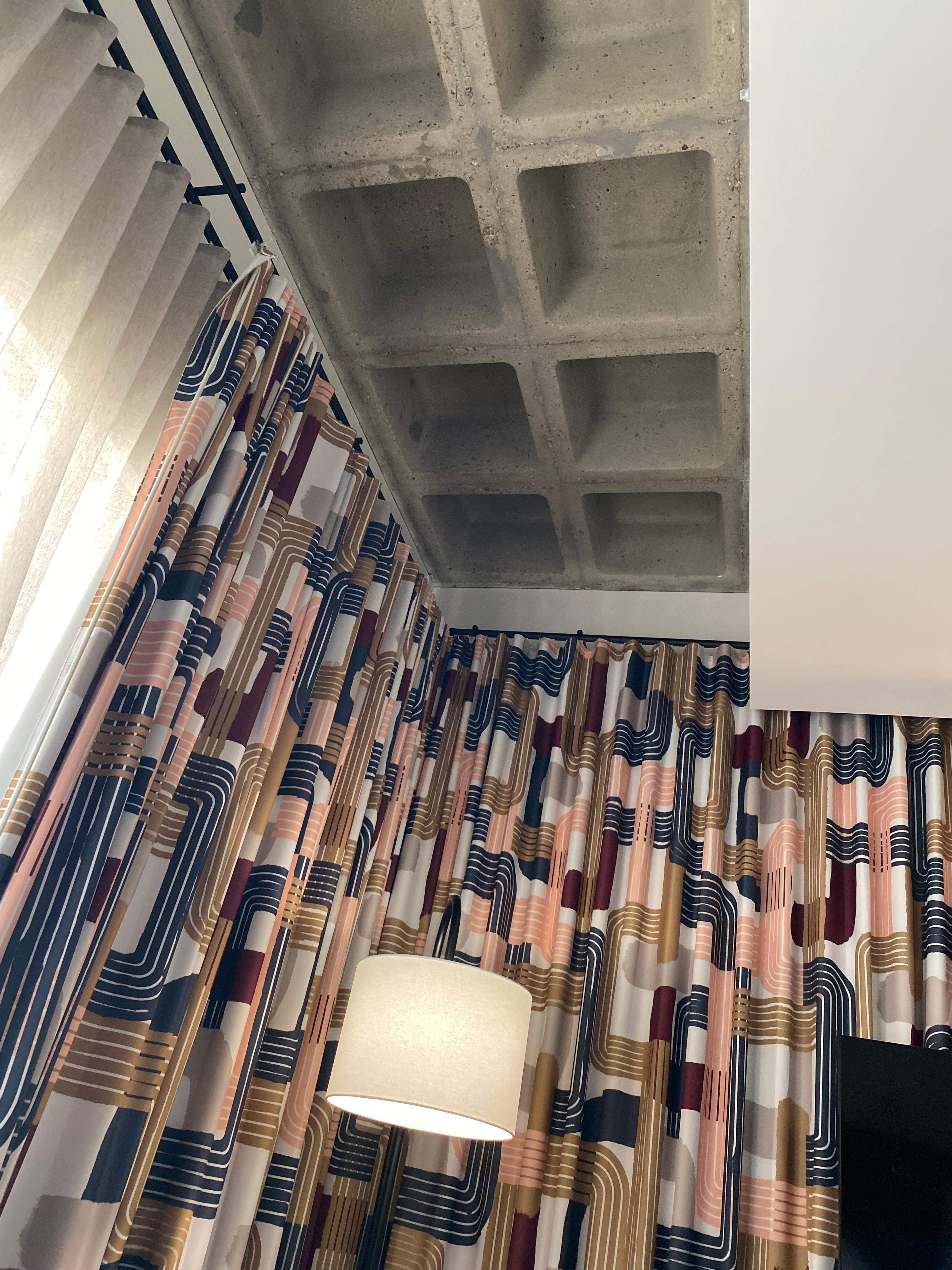 Open, concrete ceiling and huge windows!