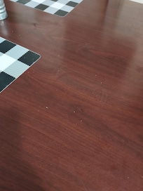 Salt/crumbs on dining table