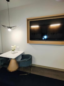Hallway with fridge,mirror and minibar