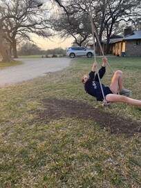 kids having fun on the swing