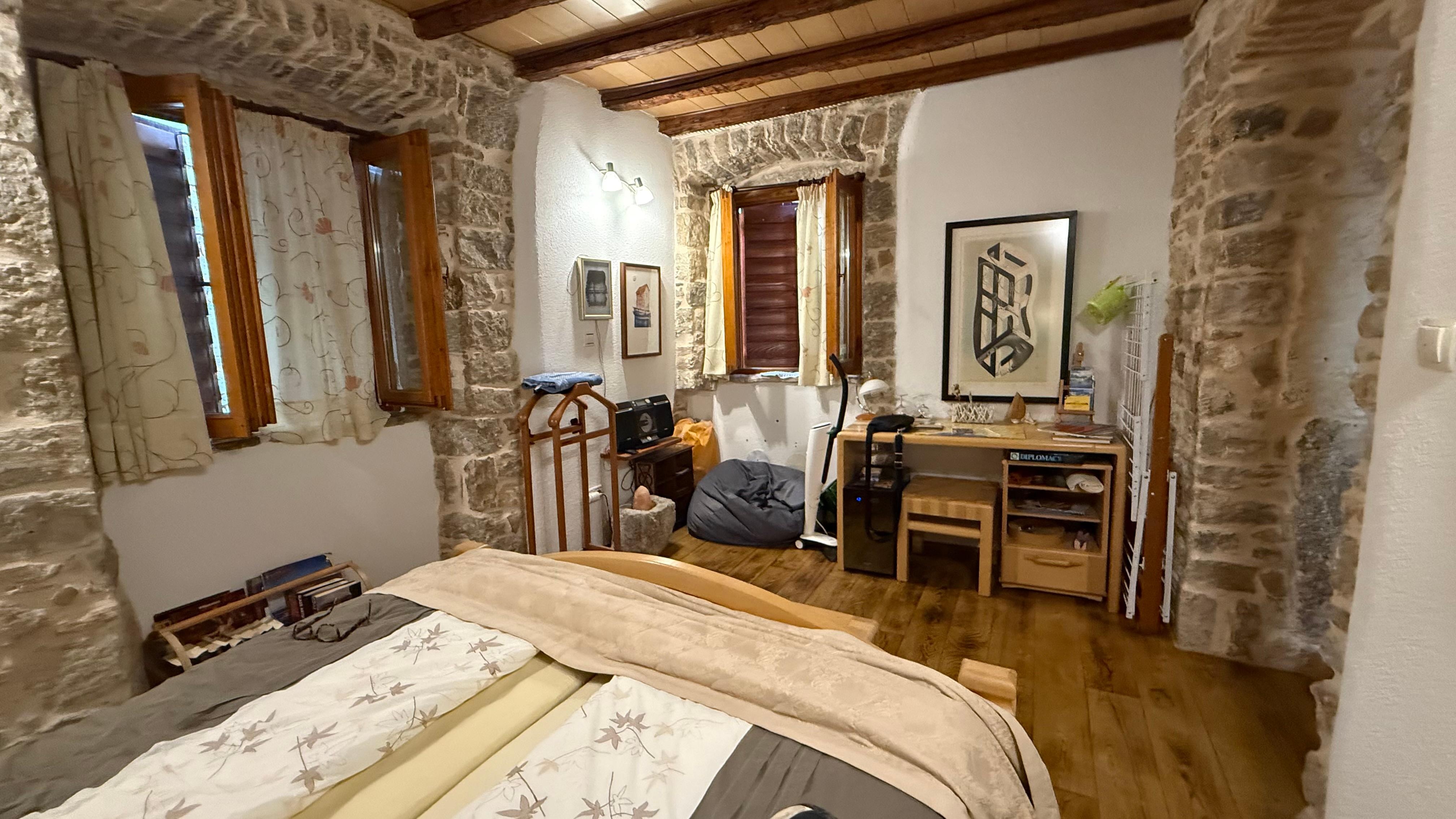 The bedroom is spacious and comfortable 