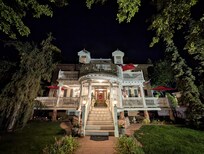 Front view of the home at night.