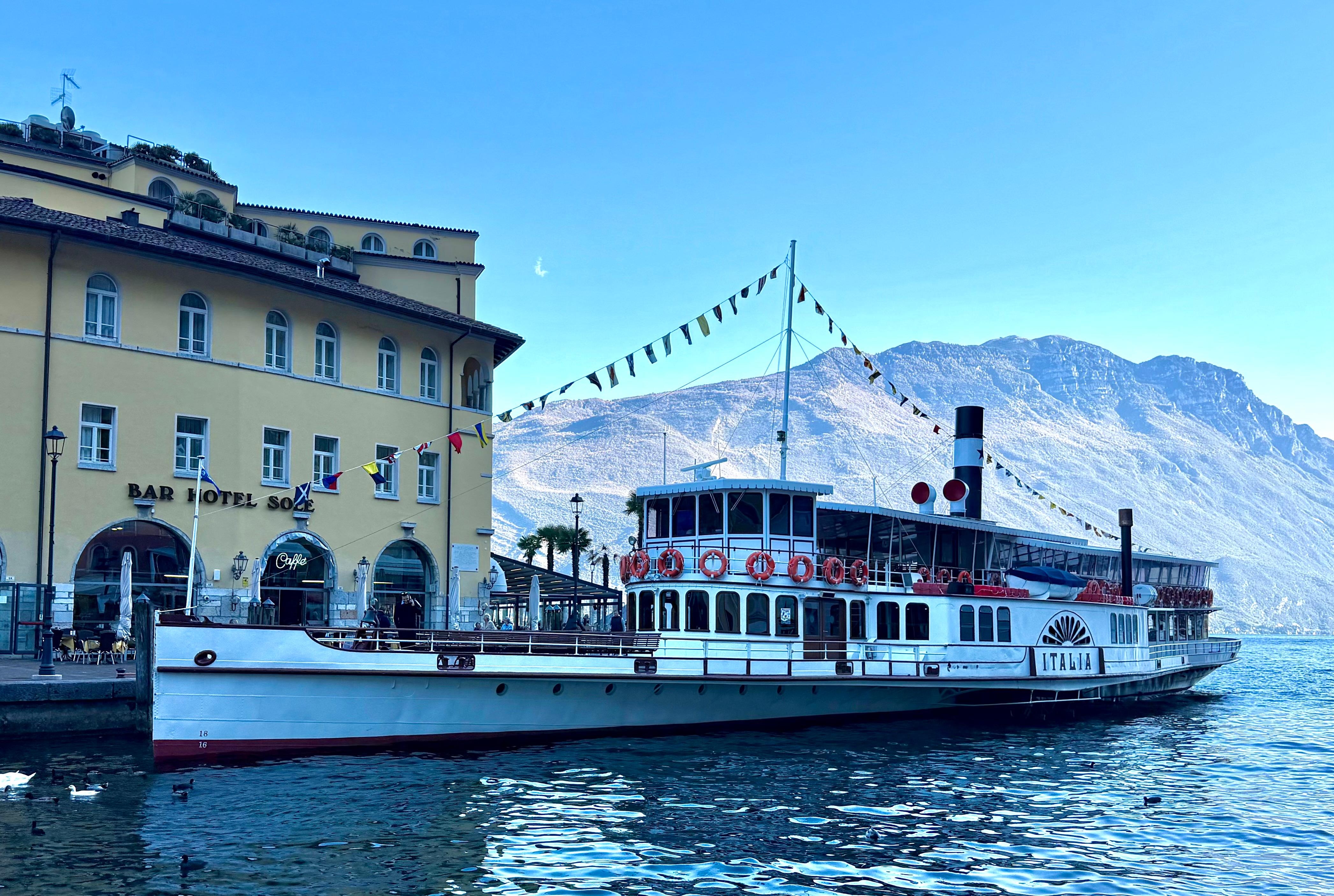 Hotel is next to ferry dock. Wonderful outdoor restaurant and gelato shop. 