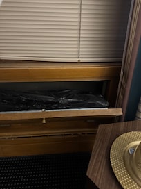 A little bag of Insulation then a screen to outside. Was open when I arrived