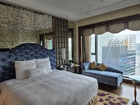 Our room...I loved the chaise lounge with the views of the city and river