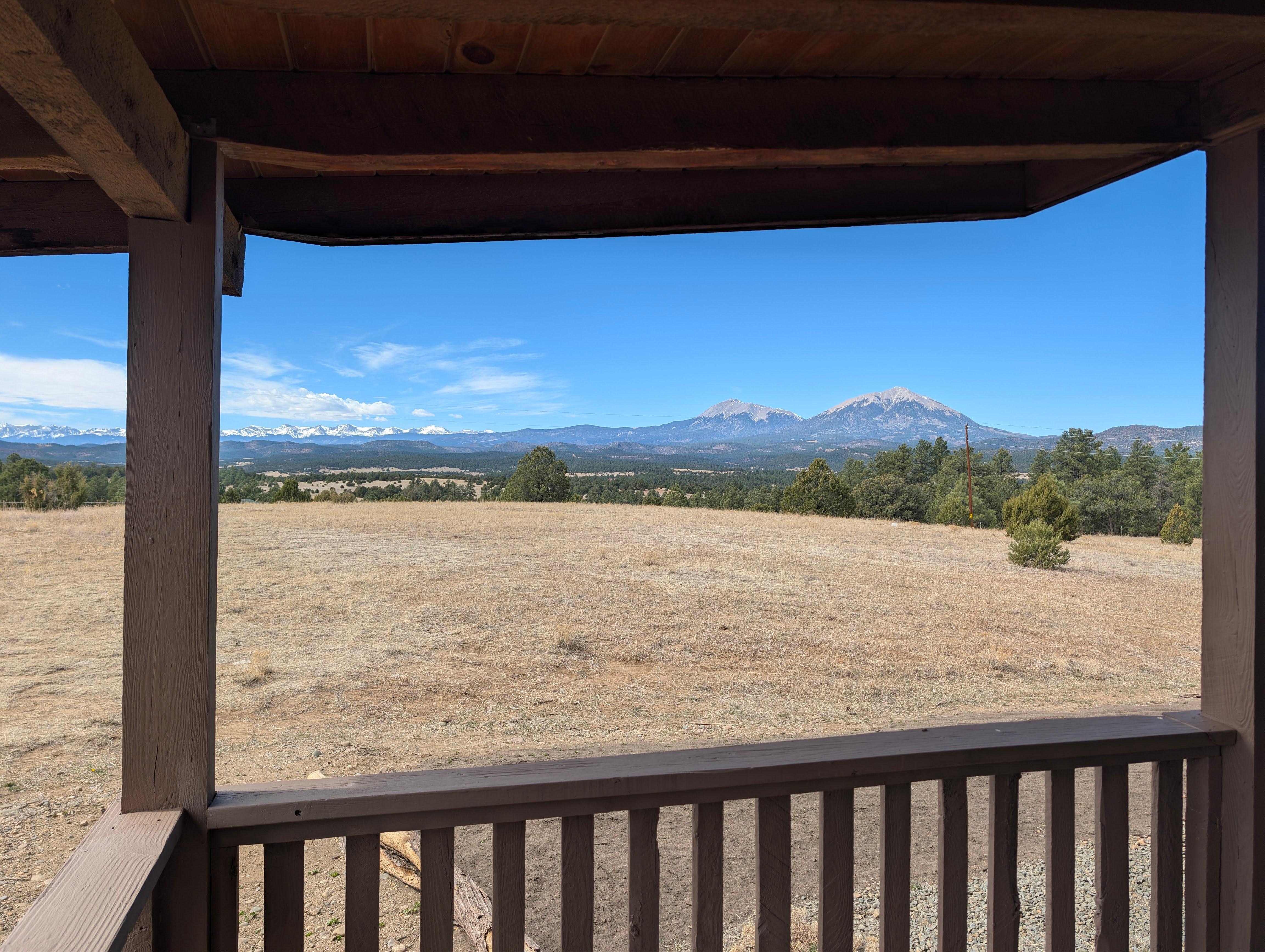 A view of the surrounding areas and San Juan Mountains and Spanish Peaks (looking West) from the lower deck