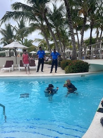 Brown teaching our 11-year-old to dive. Awesome staff cheering him on from the sidelines.