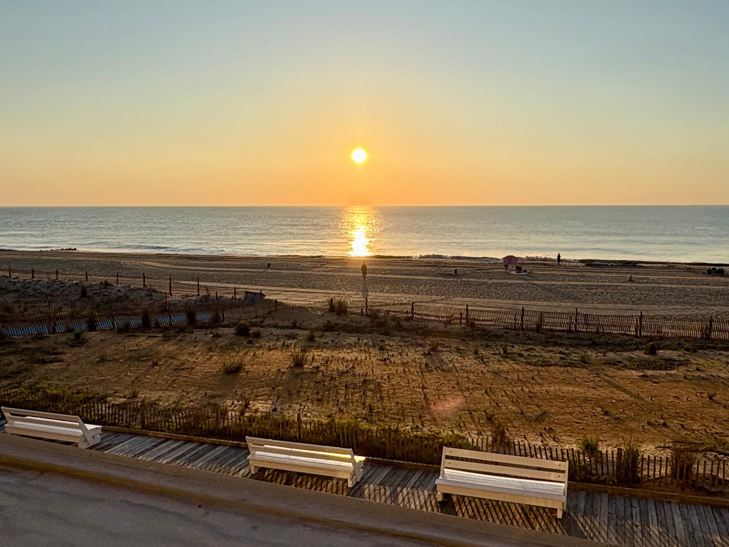 Beautiful balcony view of the sunrise over the ocean.
