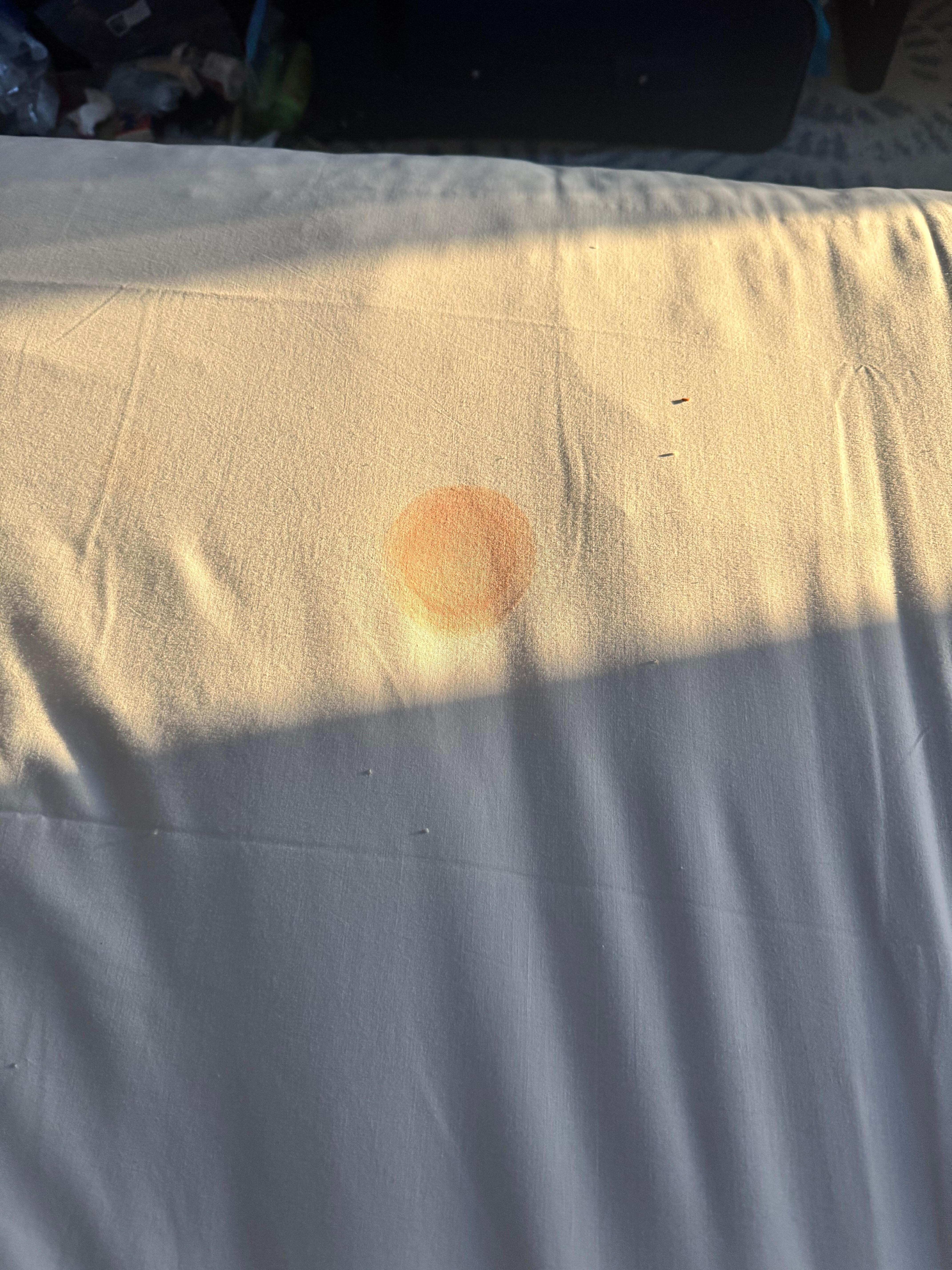 Random red orange stain