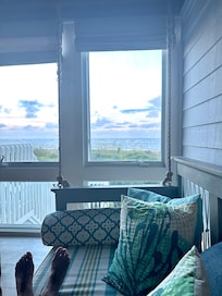 Favorite place to hang out… large swing/sofa in enclosed porch.