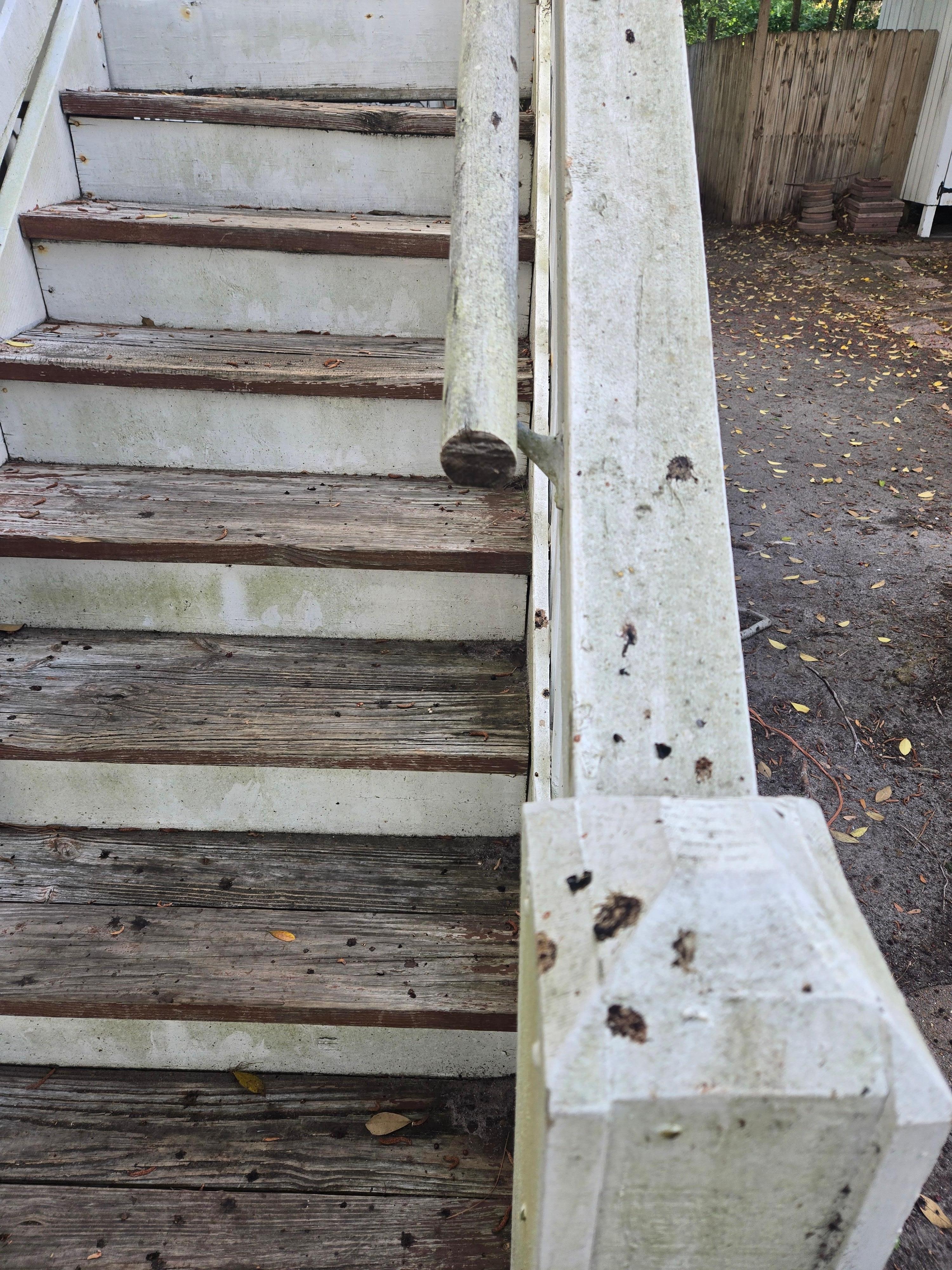 Unsafe stairs and dirty railing