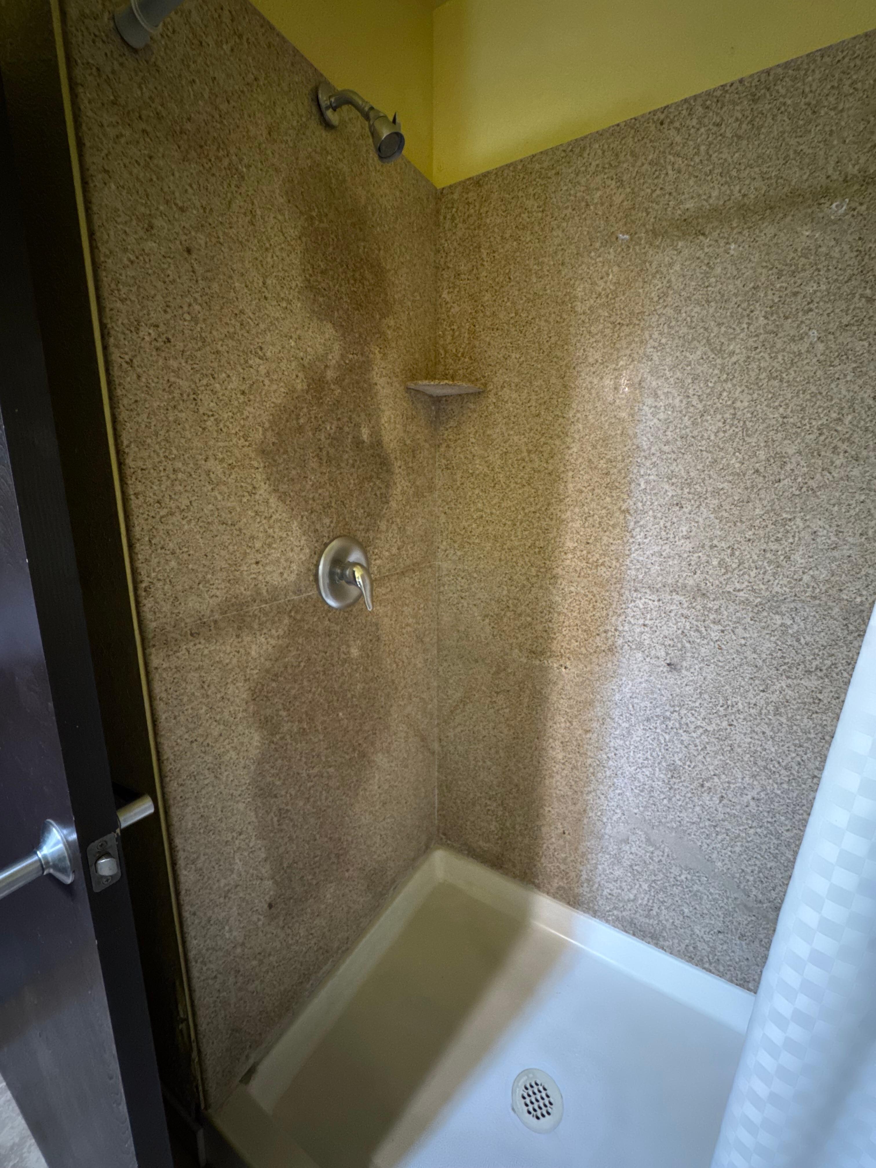 Stained dirty shower…