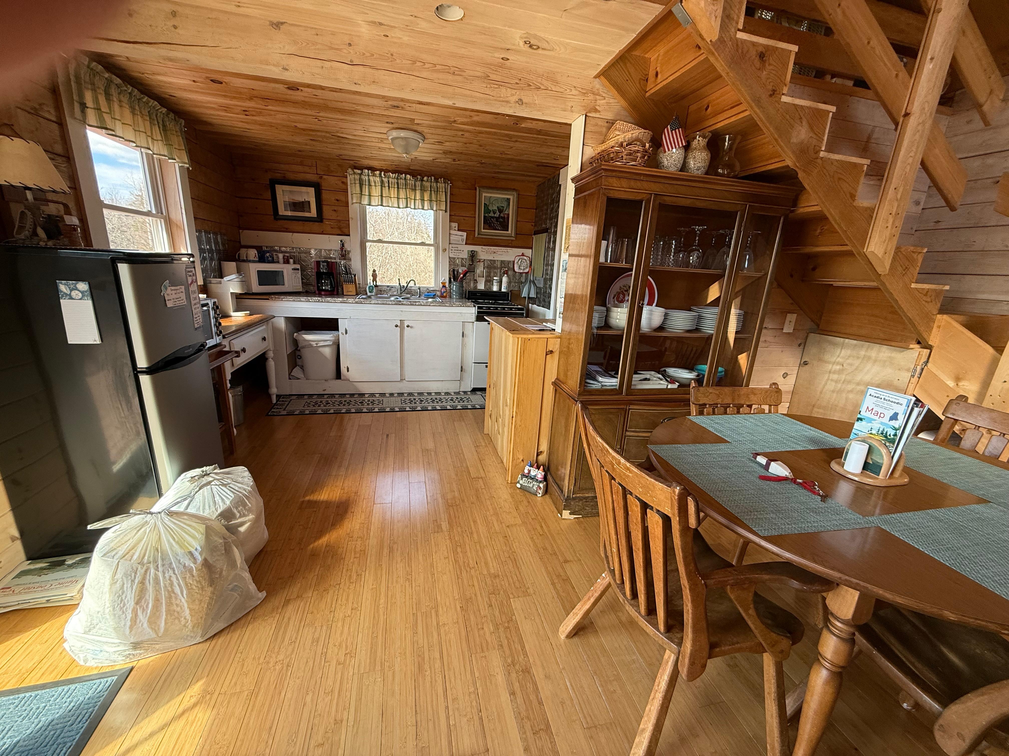 The very clean and orderly kitchen and dining room.