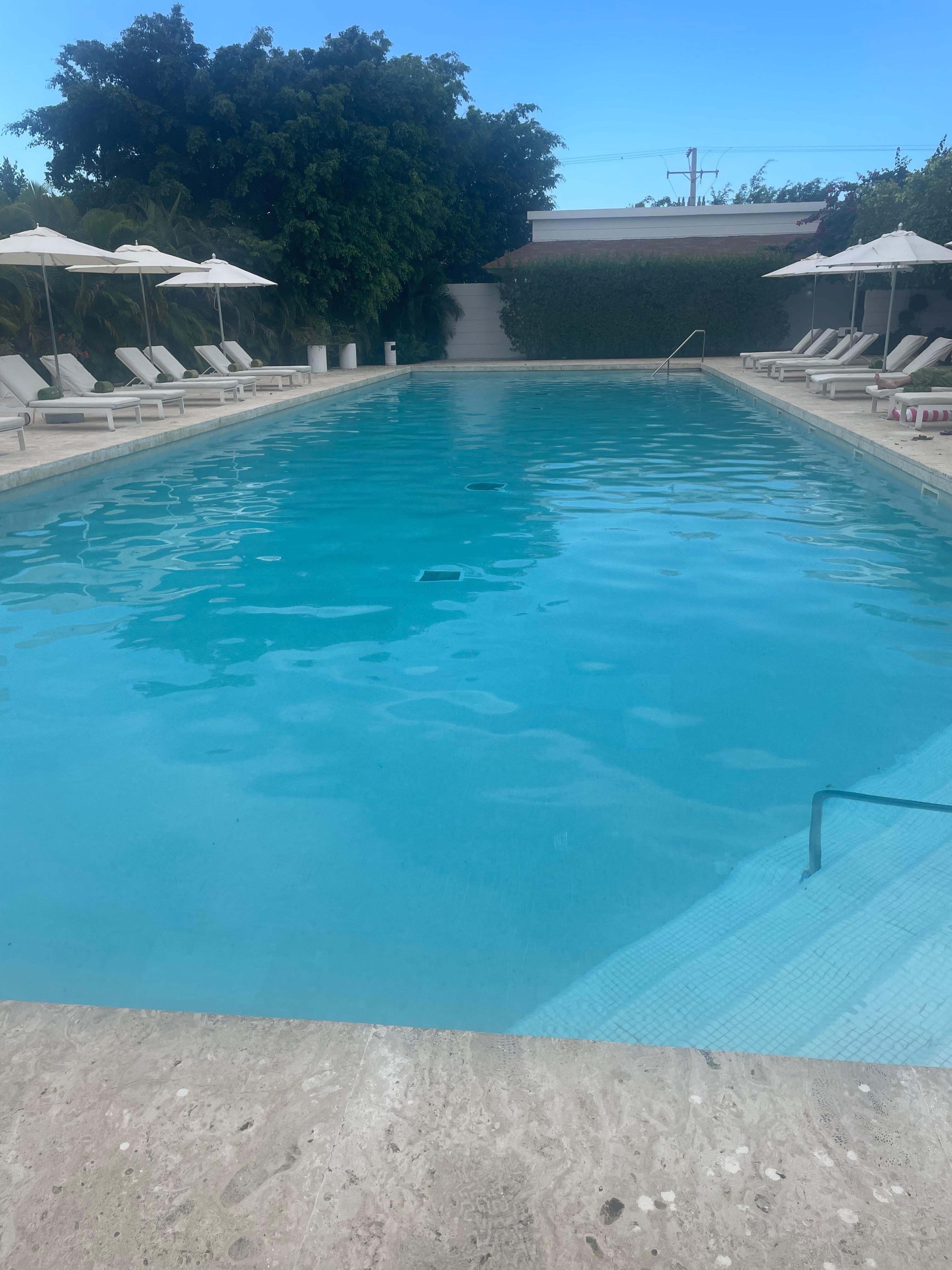 This is the only photo I happened to have on my phone. This is the spa pool. You can see how long and beautiful it is and how lovely the umbrellas look.