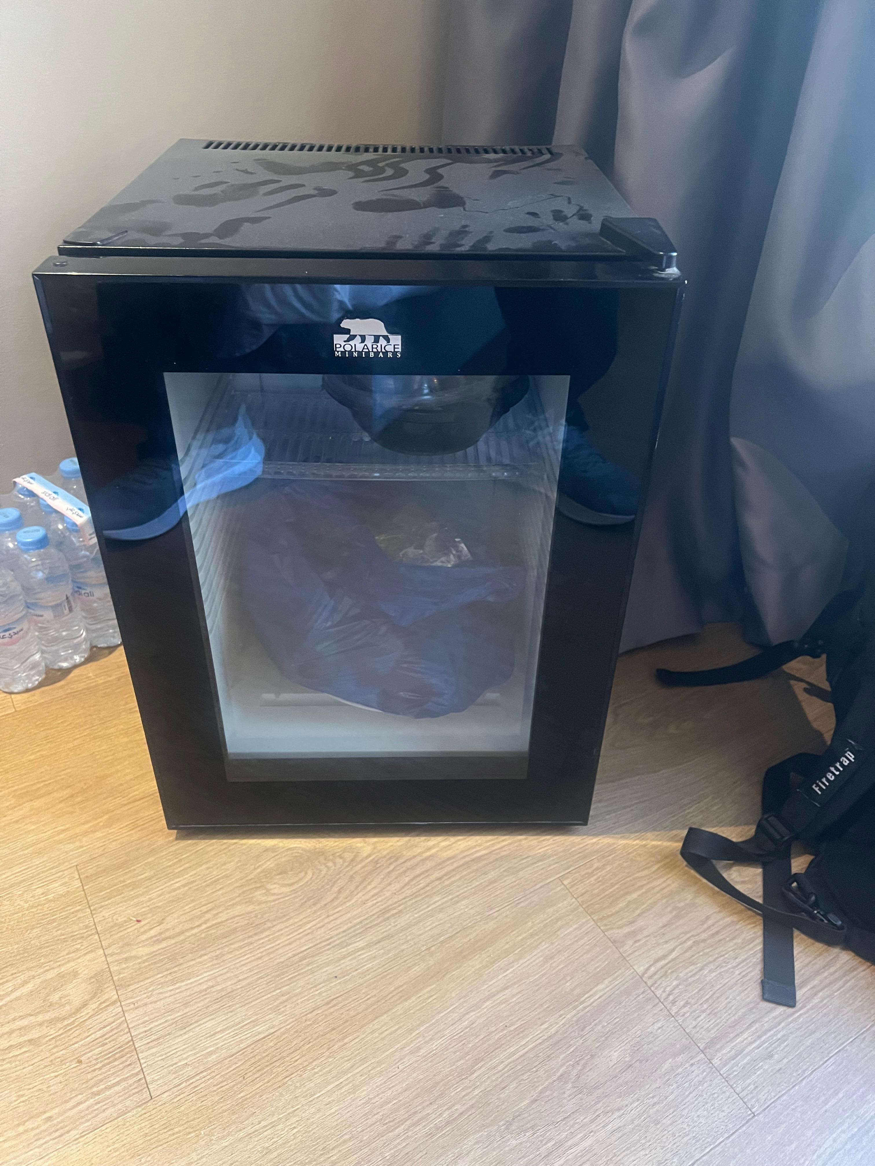 Fridge not working an dirty. Please have a look at the top of it.