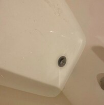 Yellow dirty bathtub