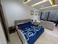 Bed was nice with a large sliding door closet next to it. Comfy couch and nice size TV