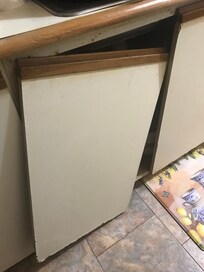 kitchen sink cabinet door falls off when open