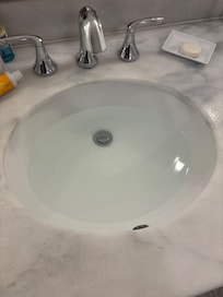 Bathroom sink has a slow drain.