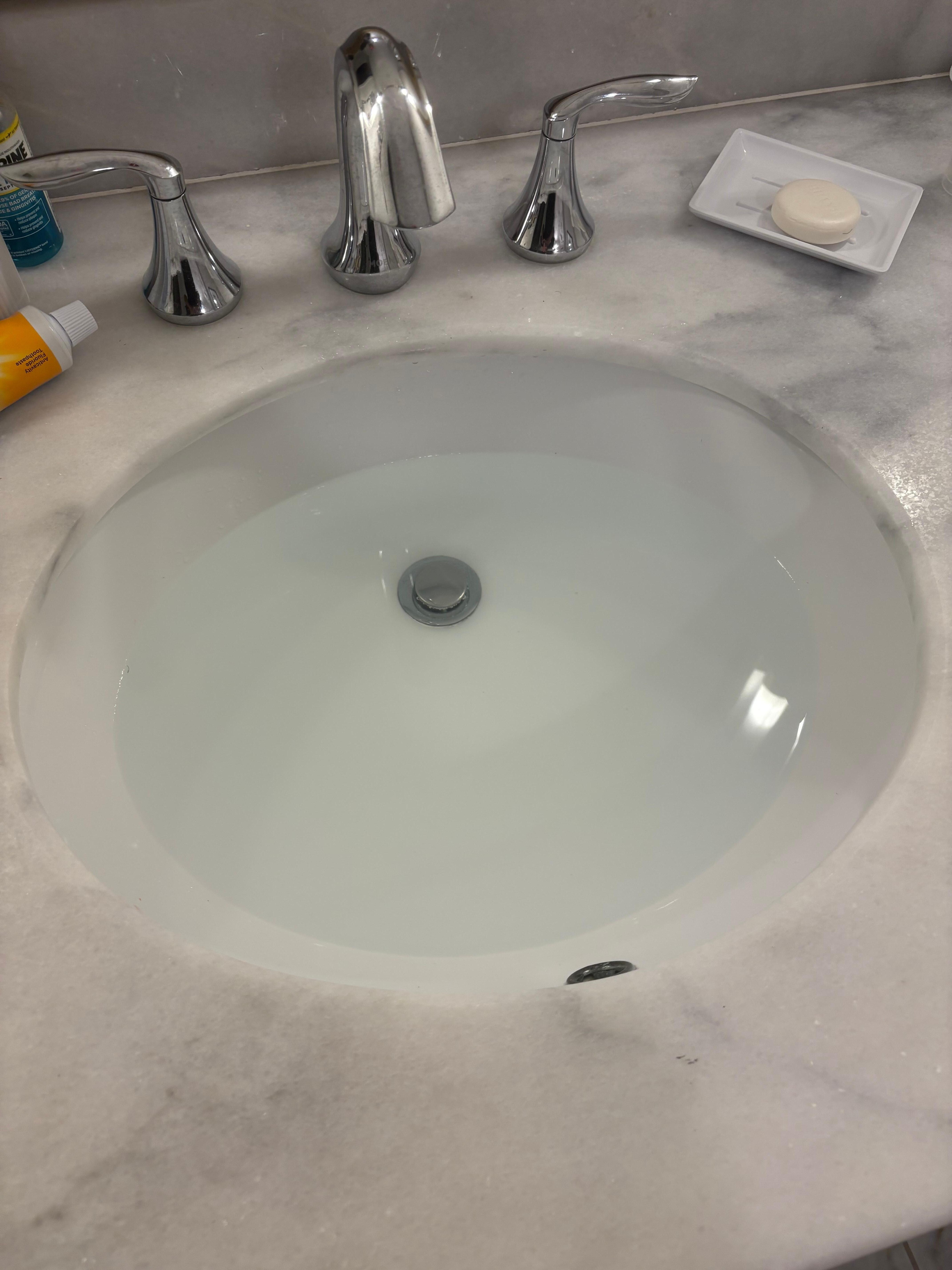 Bathroom sink has a slow drain. 