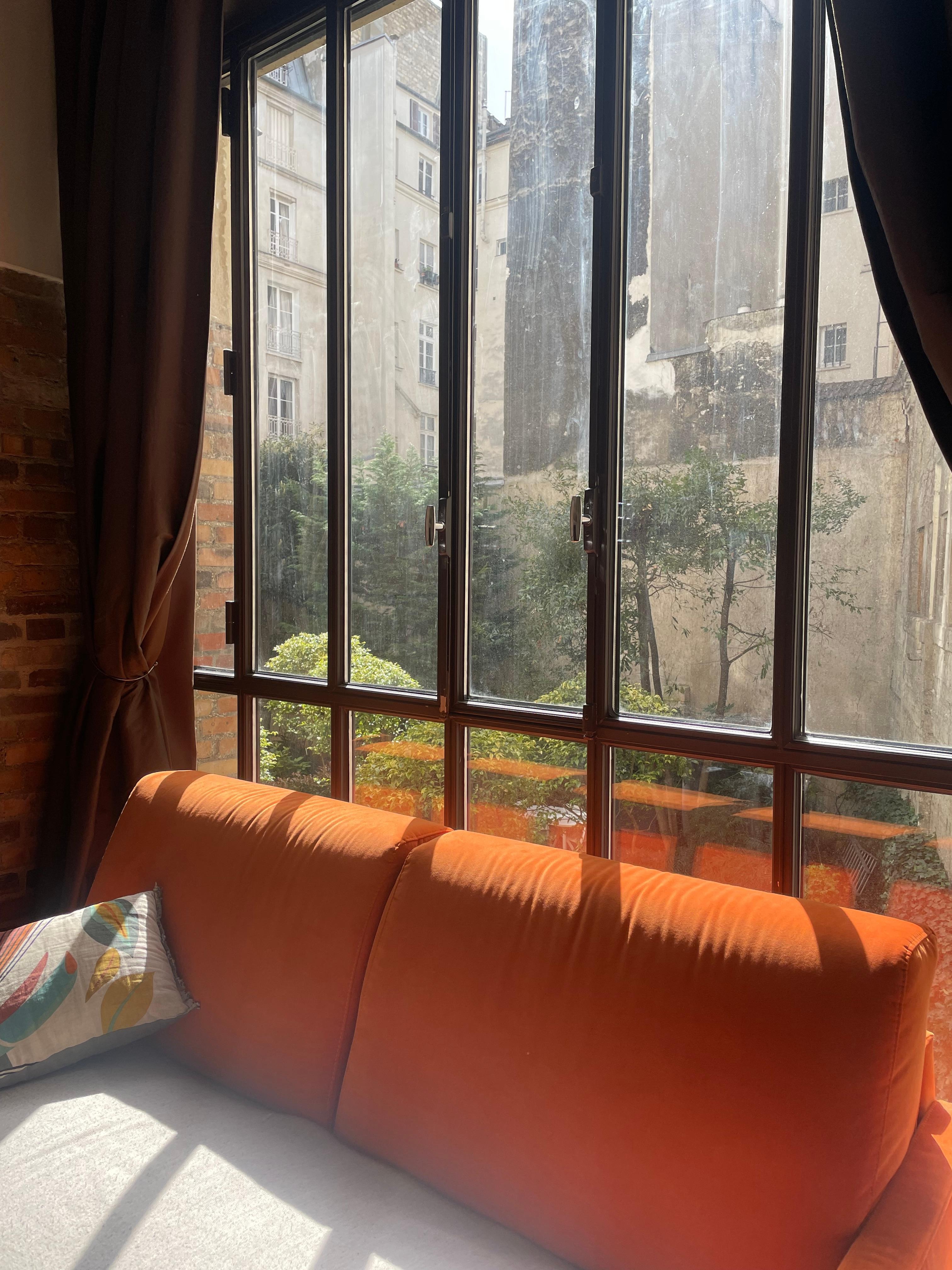 Comfy couch with beautiful courtyard view