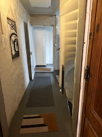 Hallway to Bathroom and kitchen.