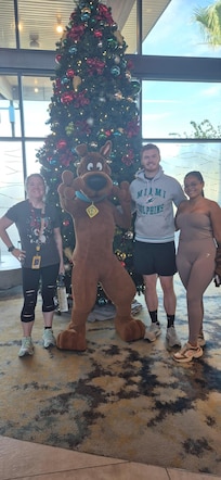 Character meeting in the lobby at Dockside.