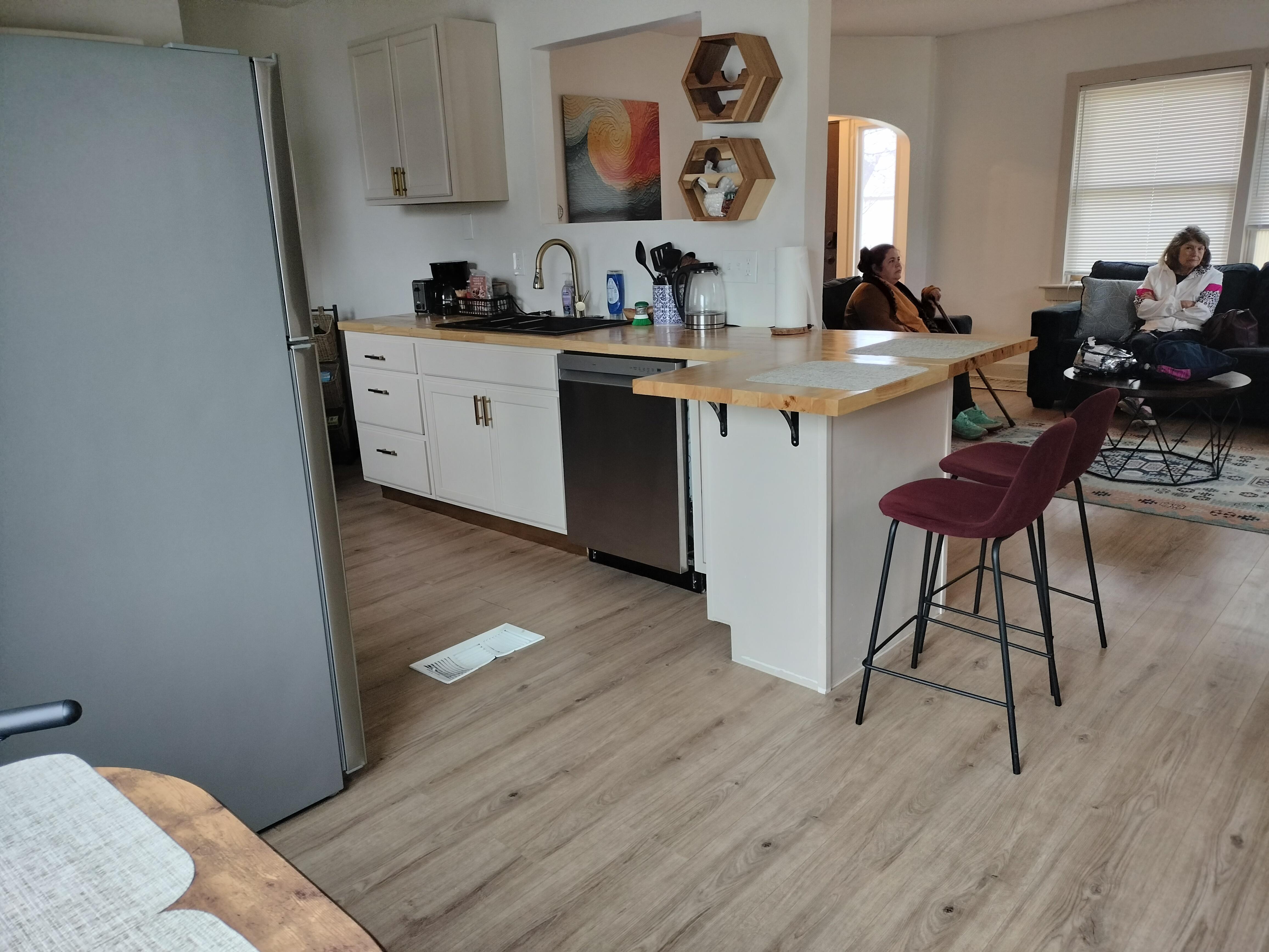 The kitchen bar and open concept living area made watching movies and eating together very easy.