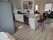 The kitchen bar and open concept living area made watching movies and eating together very easy.