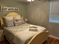 Queen size is next room from the king size. All on entrance level way to access without stairs.