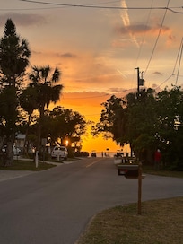 Sunset from the road in front of the home. The water is only 3 houses away.