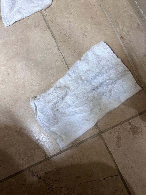 Dirty washcloth in curtain