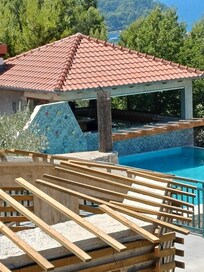 Outdoor kitchen by pool