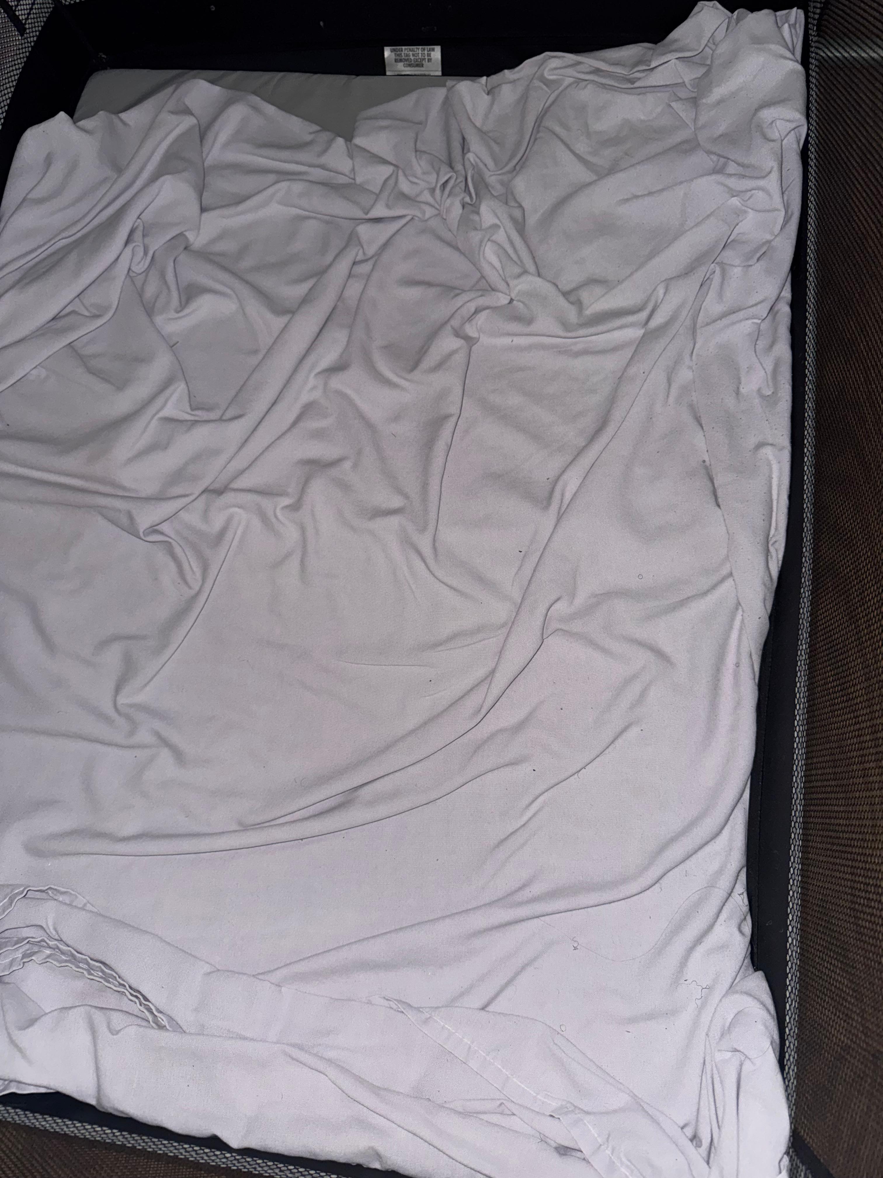 Soiled bedding in the crib