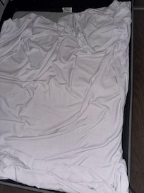 Soiled bedding in the crib