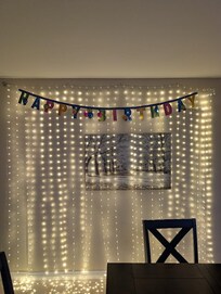 Celebrating a 30th Birthday with the provided mood lighting.