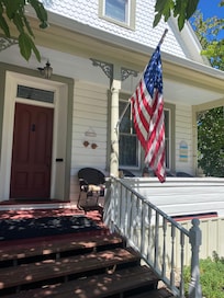 Front door with porch for lounging