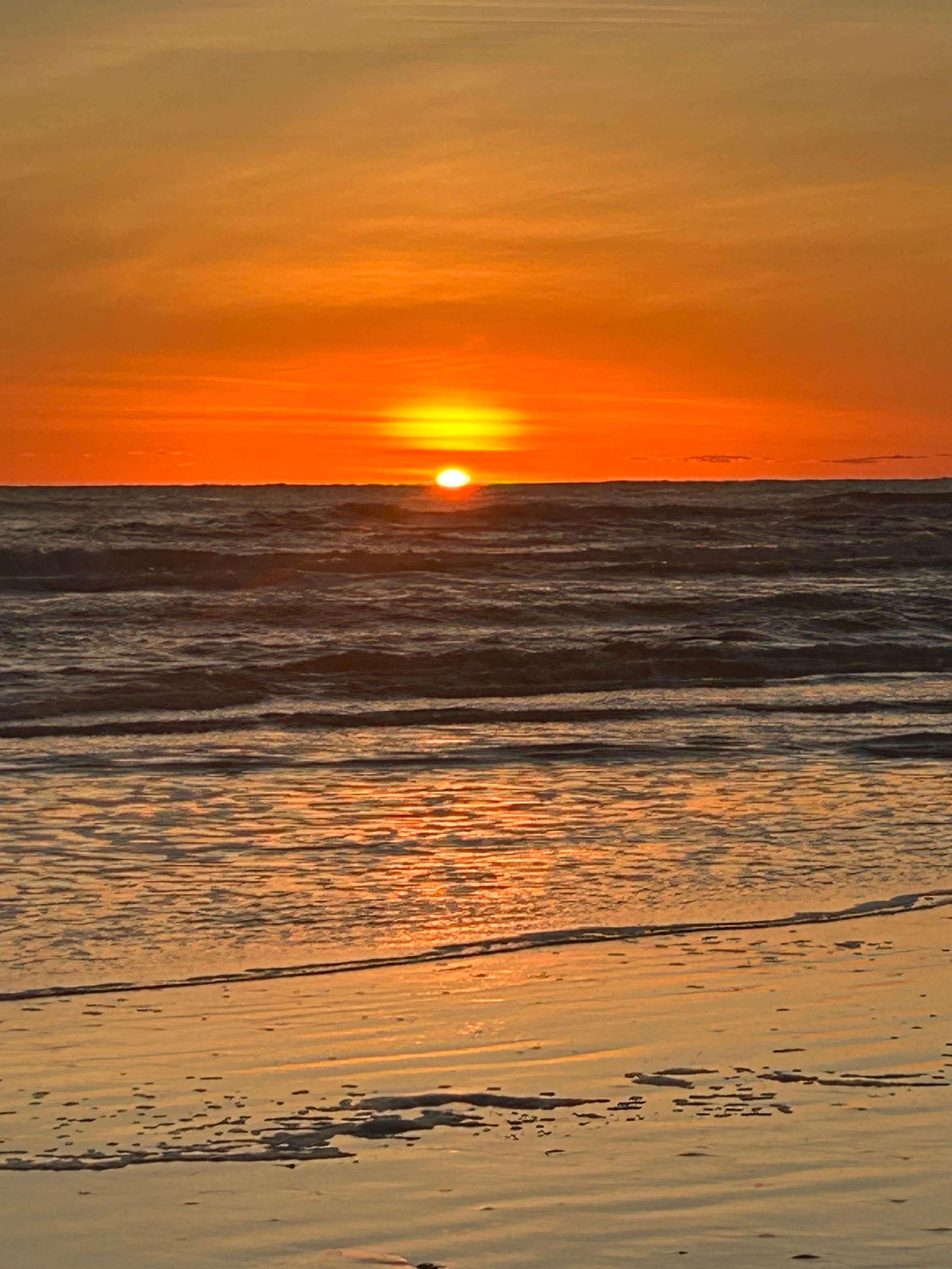 Sun rise from the beach. Just steps away from the front door 