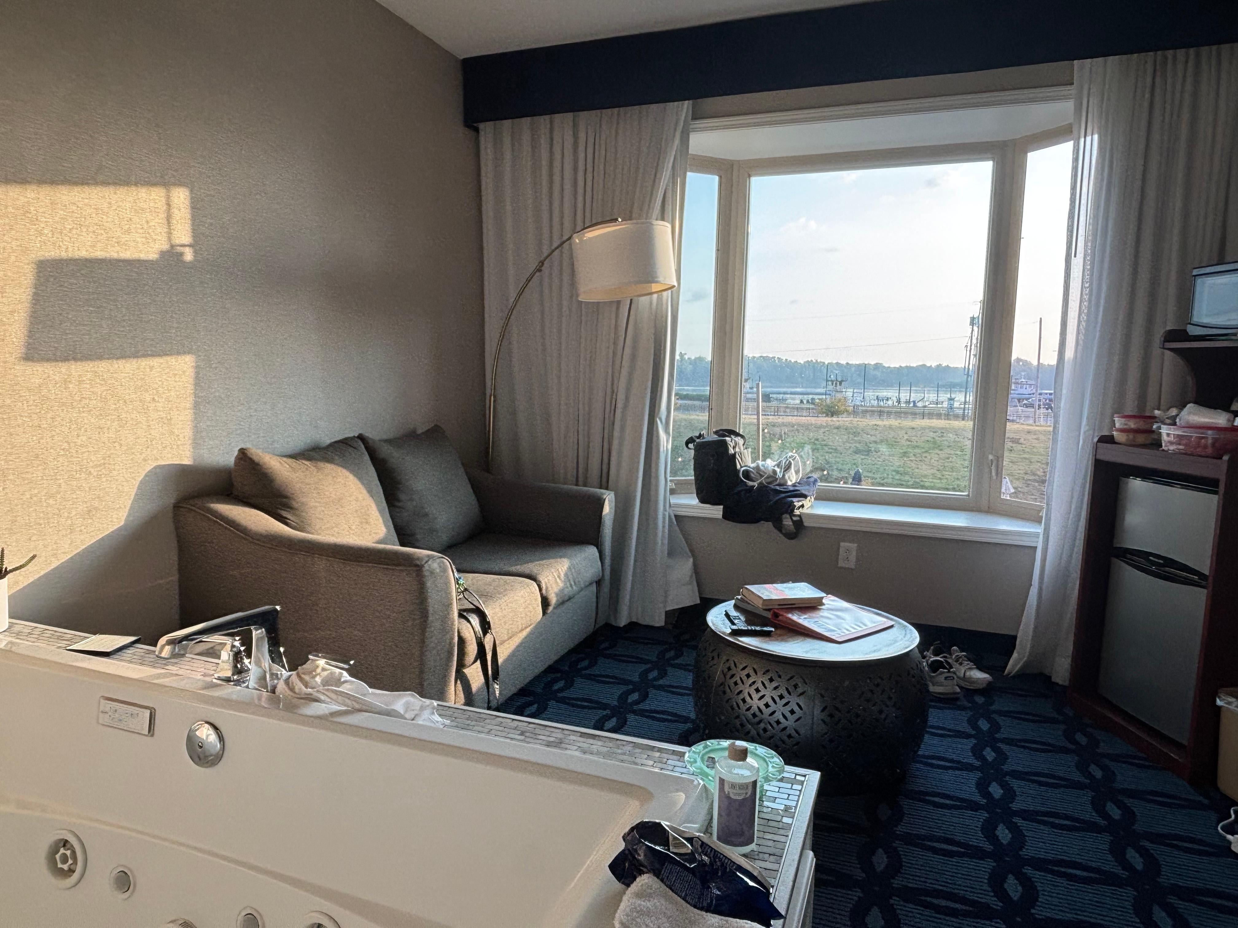 Living room with large hot tub. 