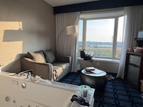 Living room with large hot tub.