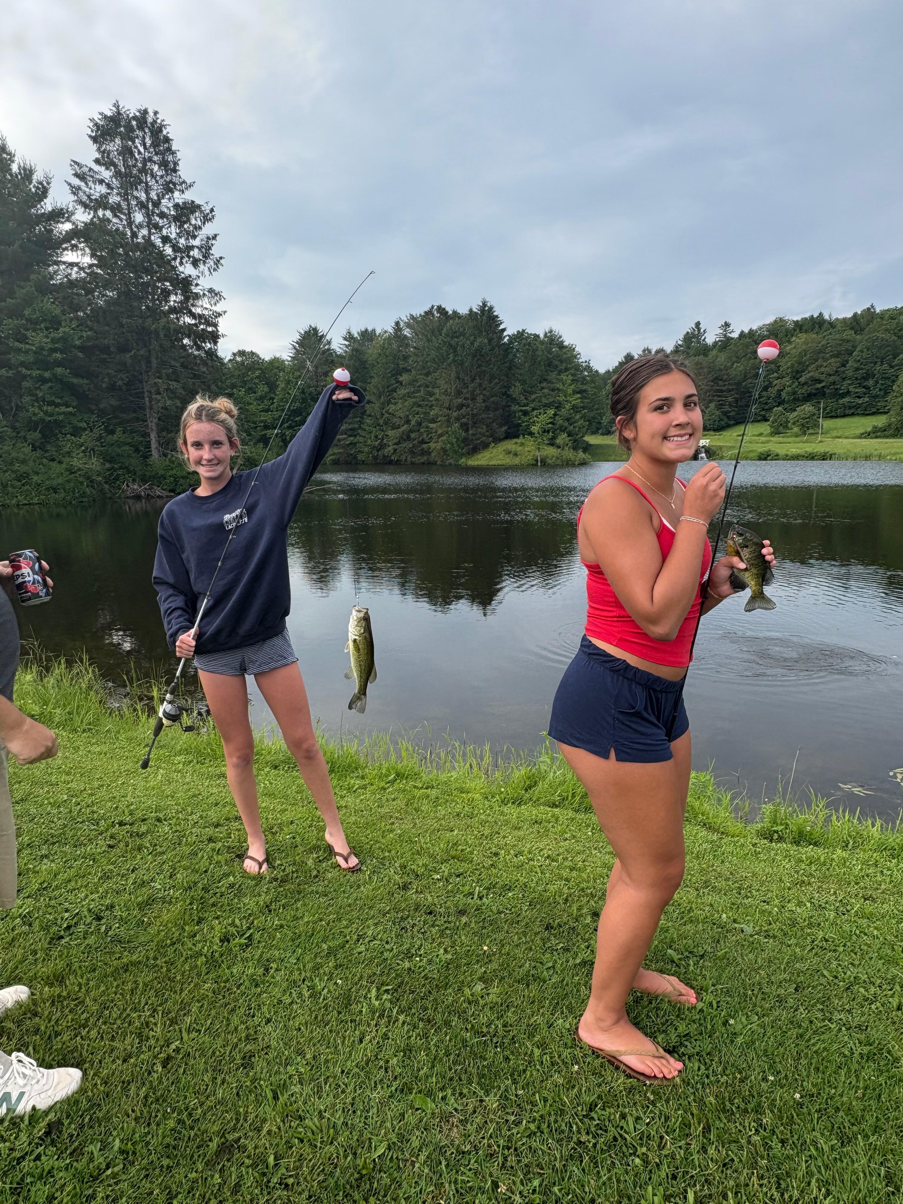 Big sisters fishing while the boys played baseball.