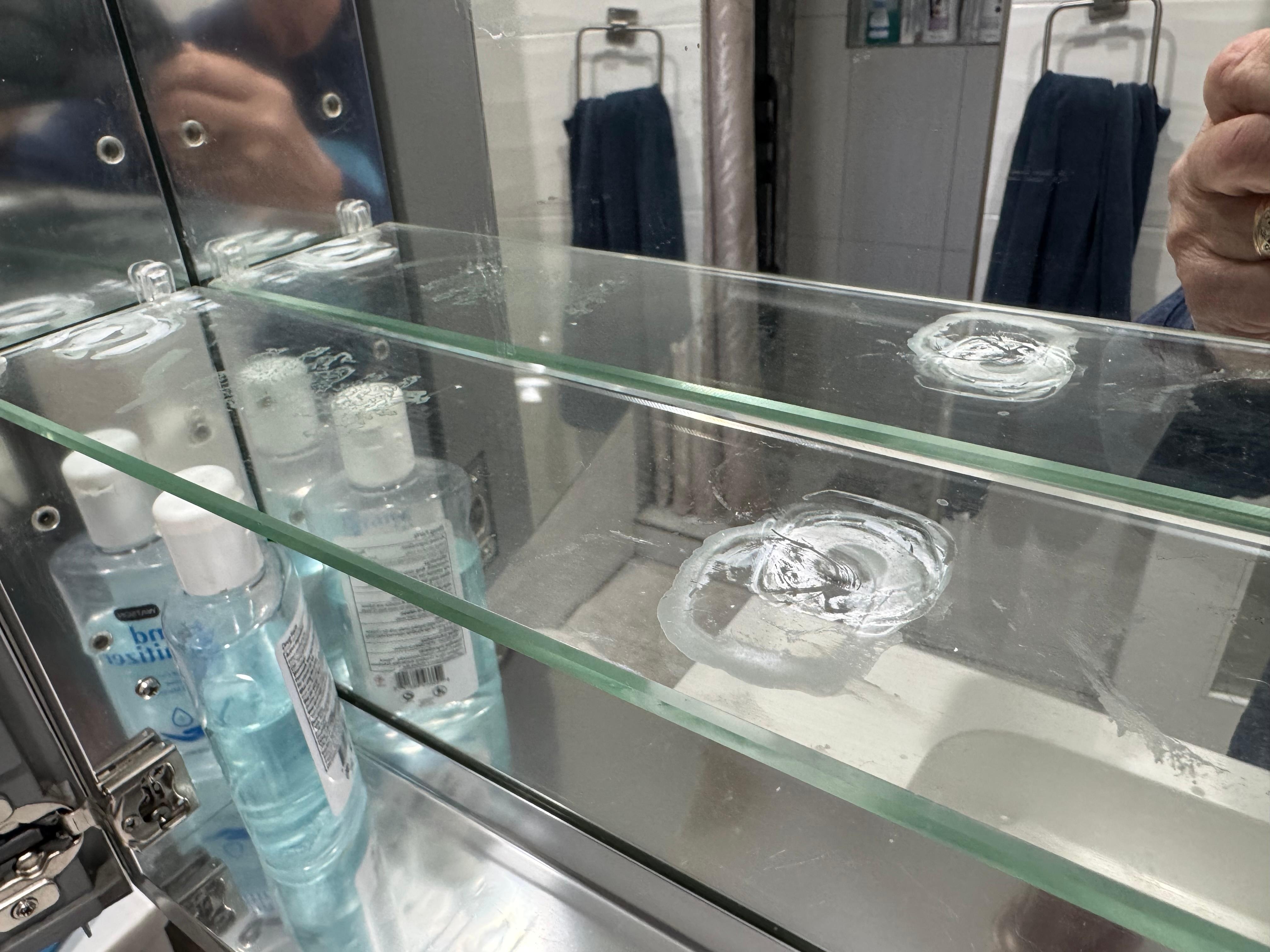 Dirty medicine cabinet shelves