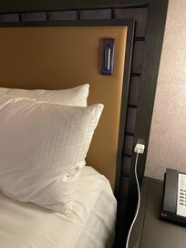 For easy charging access, the bed’s headboard has outlets on it! There is also a small reading light on the headboard too!