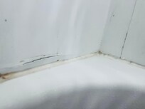 Mold and broken tub area