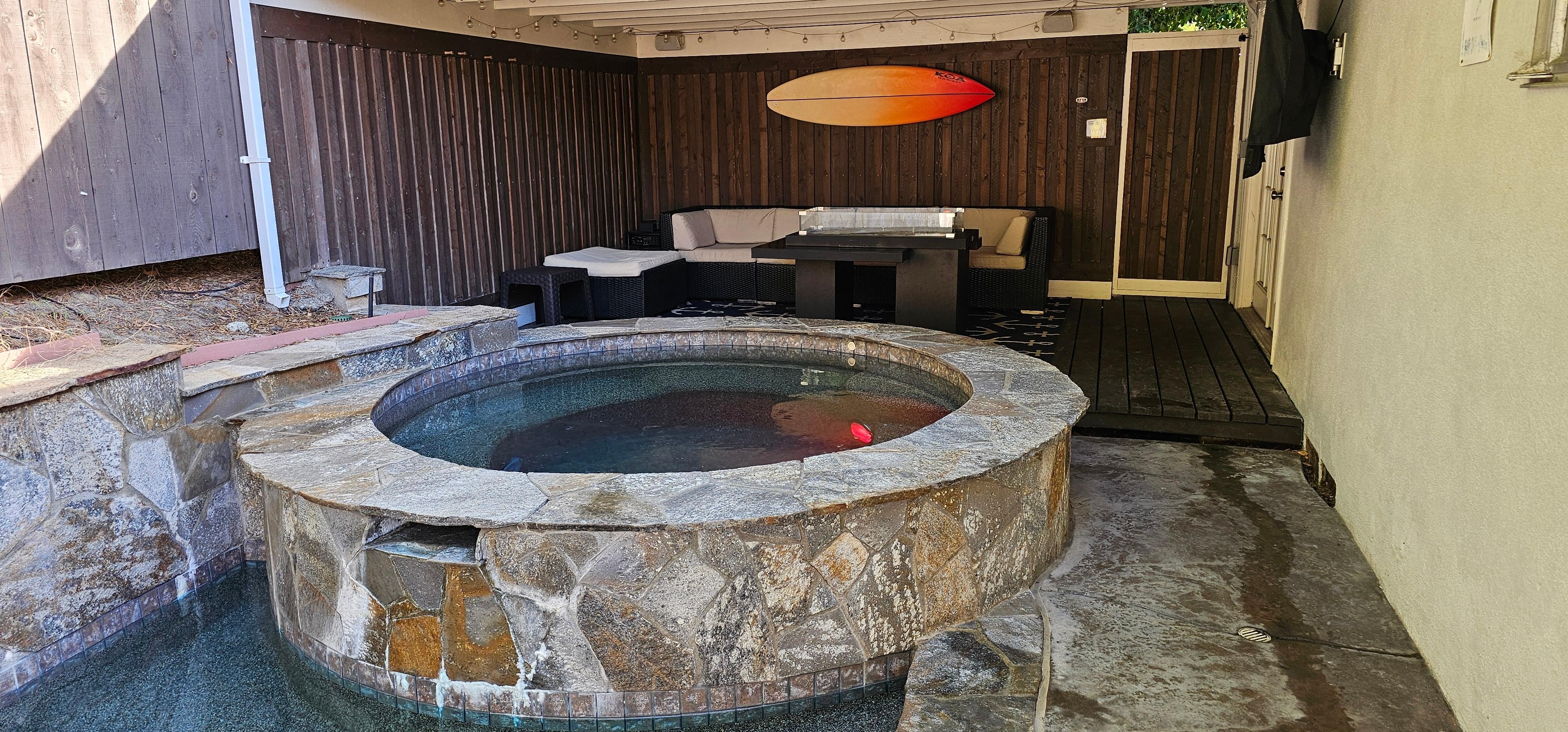 Hot tub, fire table, patio area.