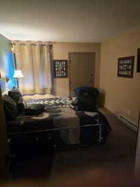 Large bedroom with queen bed.