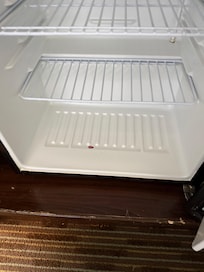 Refrigerator door and bottom had red stains