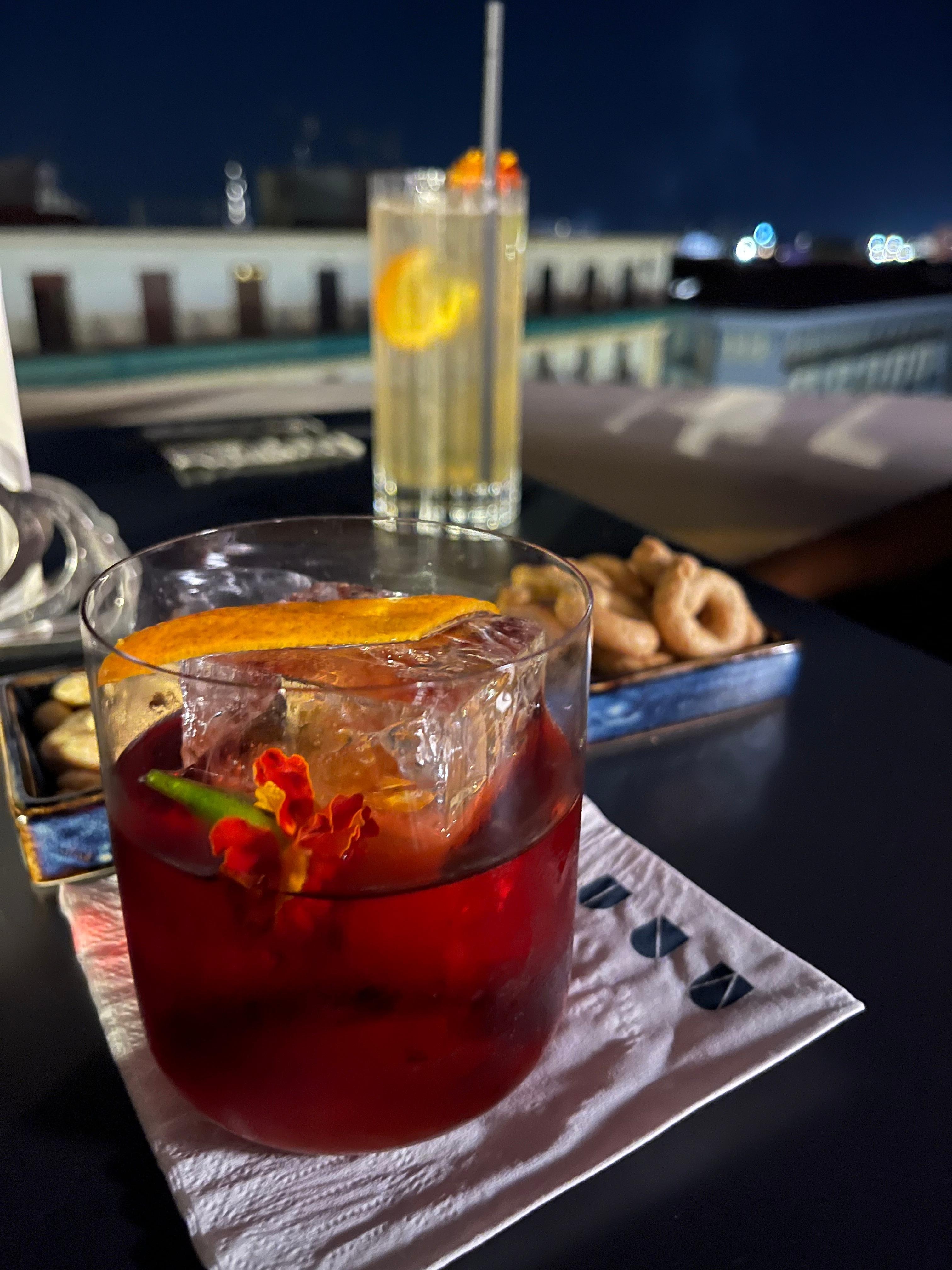 Rooftop bar drinks at night are a must at Una Hotel in Napoli!