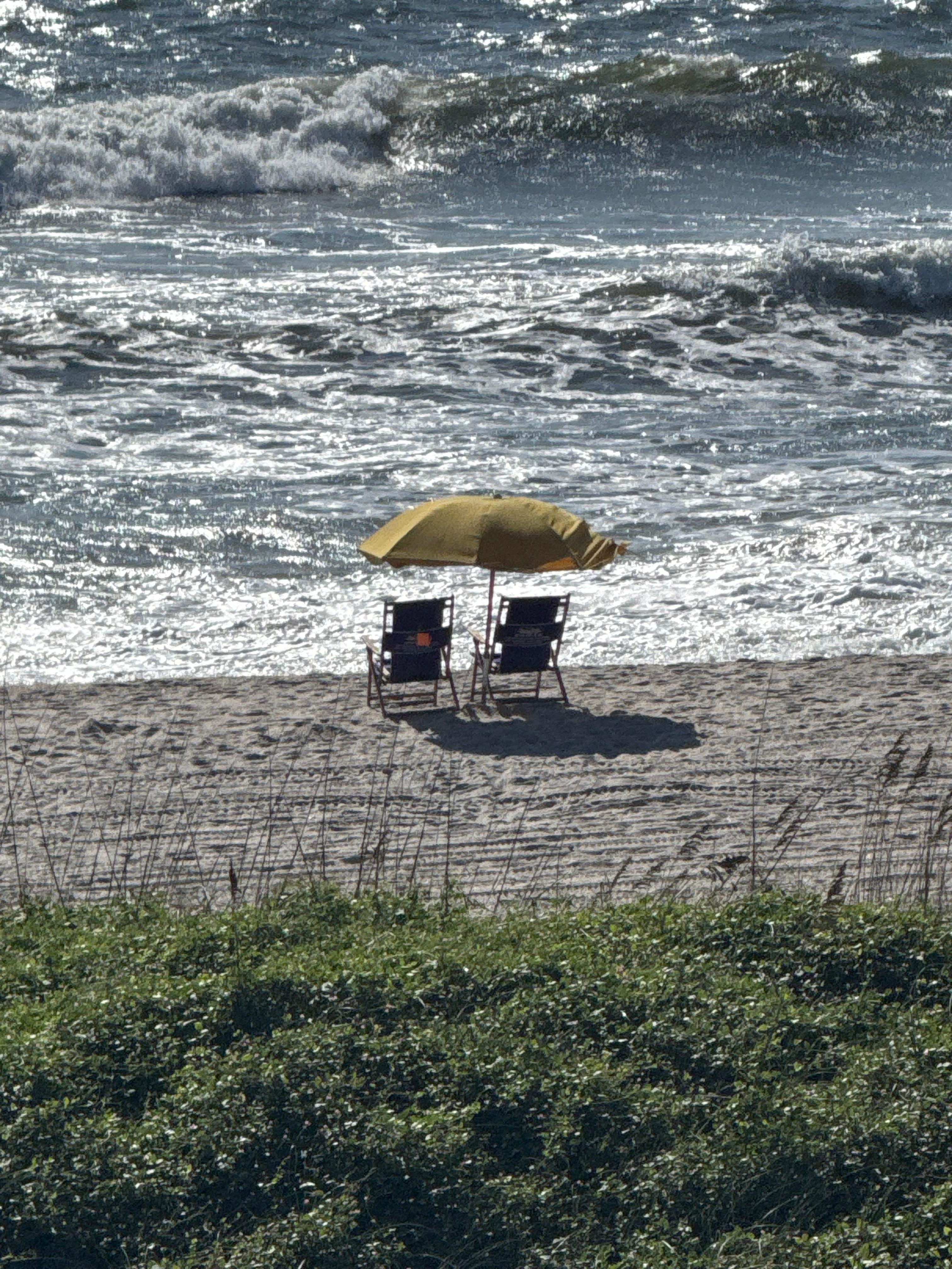 Rental chairs and umbrella waiting for us!